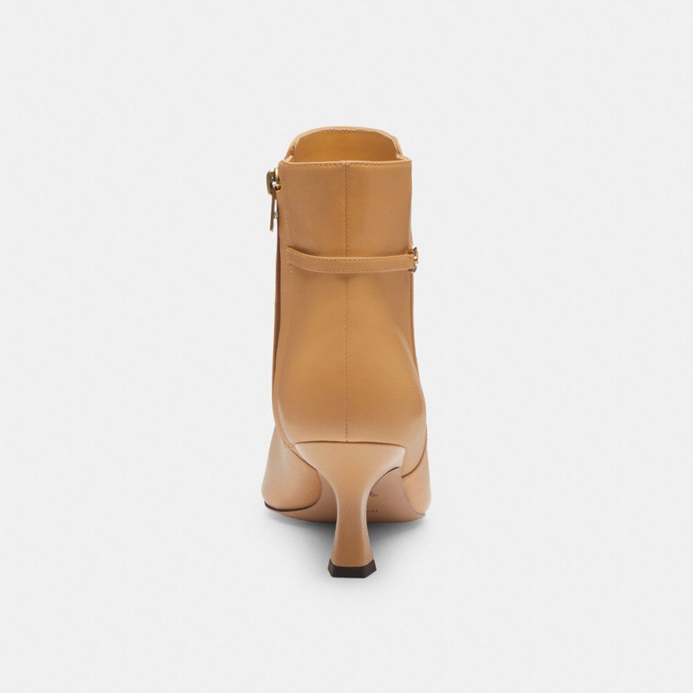 Shop Coach Rebecca Bootie In Tan