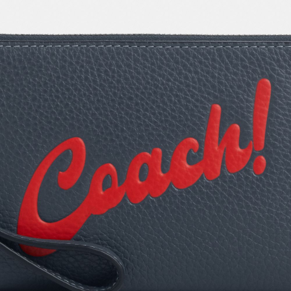 COACH®,CORNER ZIP WRISTLET WITH COACH GRAPHIC,Mini,Silver/Denim