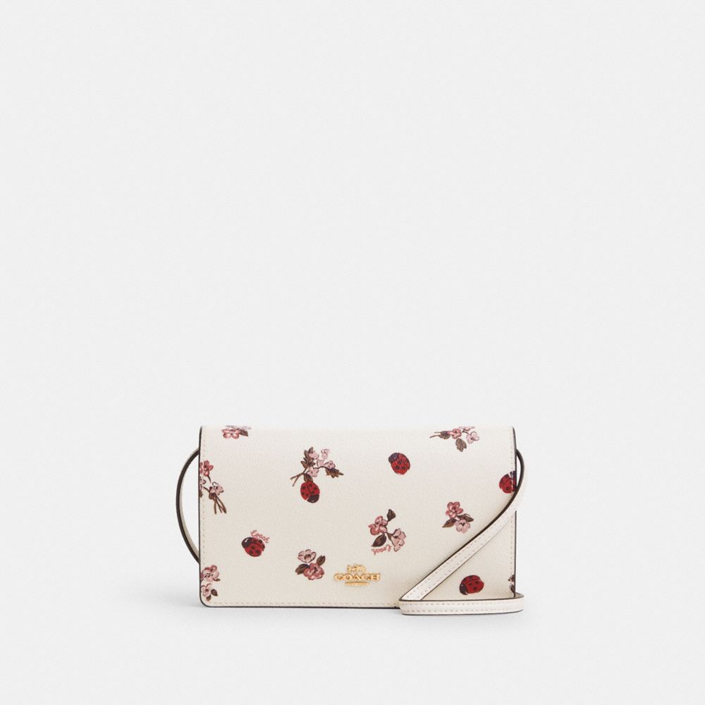 COACH®,ANNA FOLDOVER CLUTCH CROSSBODY WITH LADYBUG FLORAL PRINT,Novelty Print,Mini,Gold/Chalk Multi,Front View