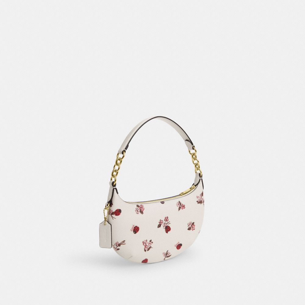 COACH®,MINI PAYTON AVEC IMPRIMÉ FLORAL COCCINELLE,PVC,Or/Craie Multi,Angle View