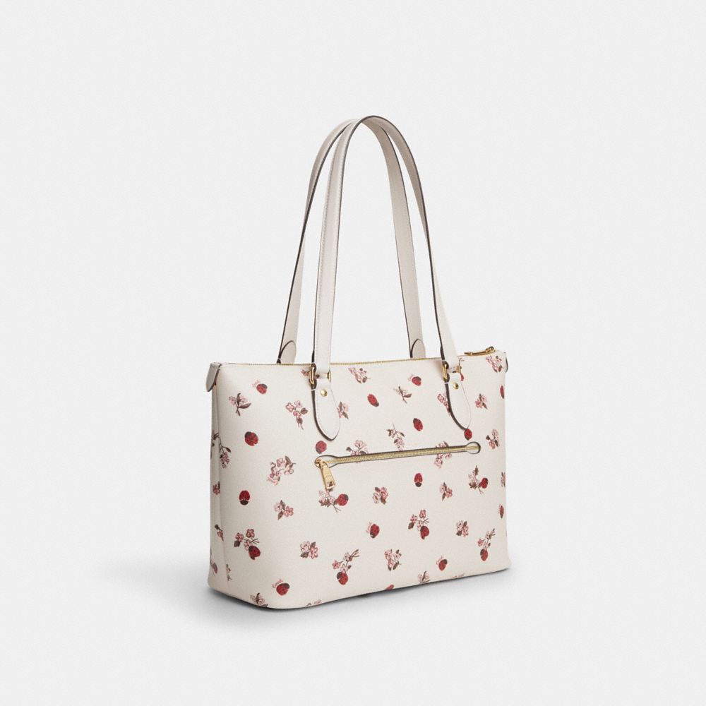 COACH®,GALLERY TOTE BAG WITH LADYBUG FLORAL PRINT,Novelty Print,Gold/Chalk Multi,Angle View