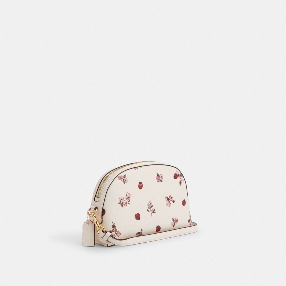 COACH®,SAC PORTÉ-CROISÉ MADI AVEC IMPRIMÉ FLORAL COCCINELLE,PVC,Or/Craie Multi,Angle View