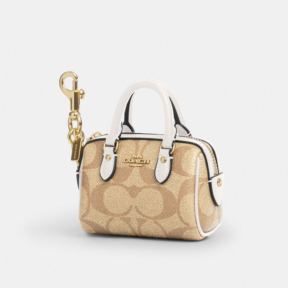 COACH®,MINI ROWAN SATCHEL BAG CHARM IN SIGNATURE CANVAS,Mini,Gold/Light Khaki Chalk,Front View