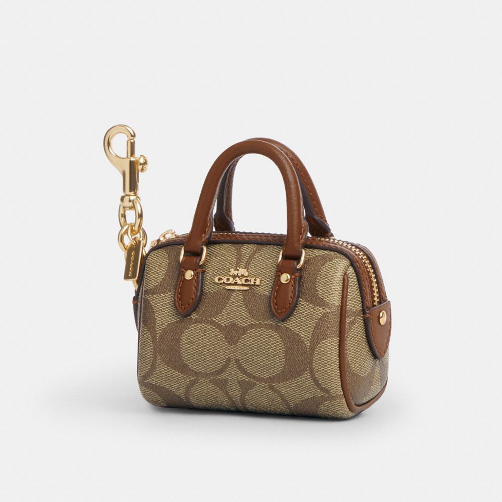 COACH®,MINI ROWAN SATCHEL BAG CHARM IN SIGNATURE CANVAS,Mini,Gold/Khaki Saddle 2,Front View