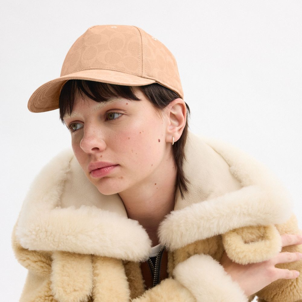 COACH®,Signature Sun Bleached Baseball Hat,Beige,Angle View