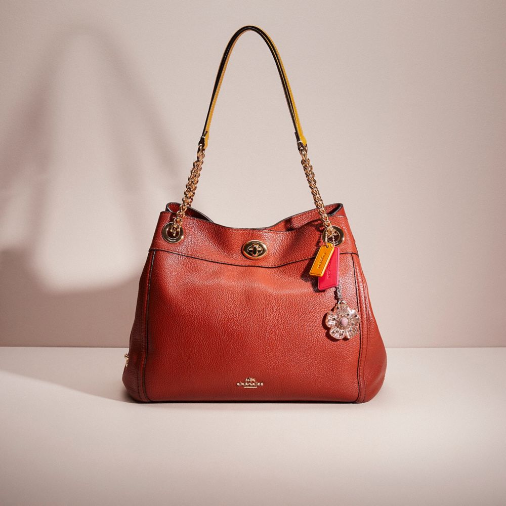 Coach pebble store turnlock edie