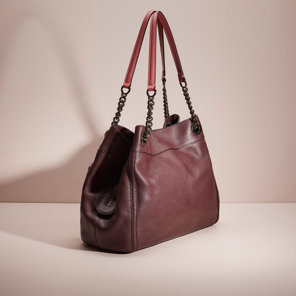 Coach edie best sale oxblood bag