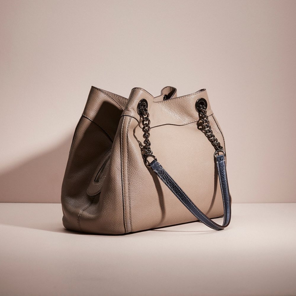 Coach pebble turnlock discount edie