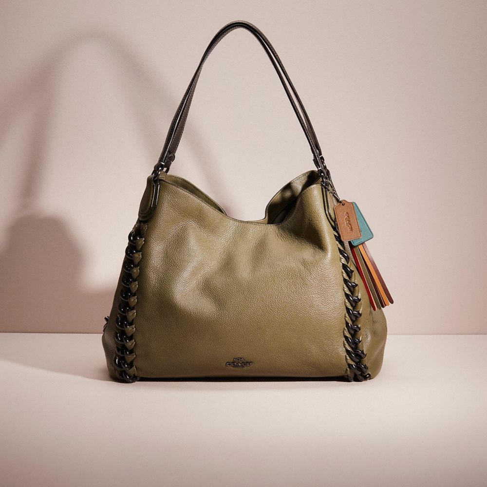 Edie coach bag store on sale