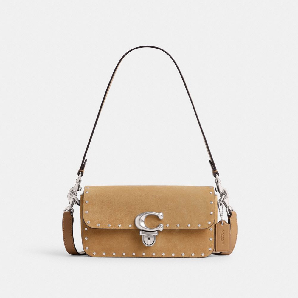 Coach purse with rivets sale