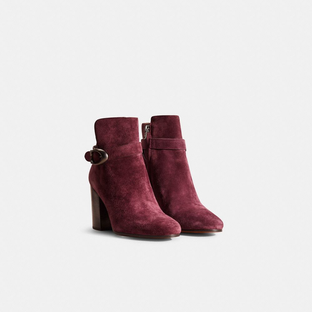 COACH®,RESTORED DELANEY SIGNATURE BUCKLE HEEL BOOTIE,Suede,Oxblood,Angle View