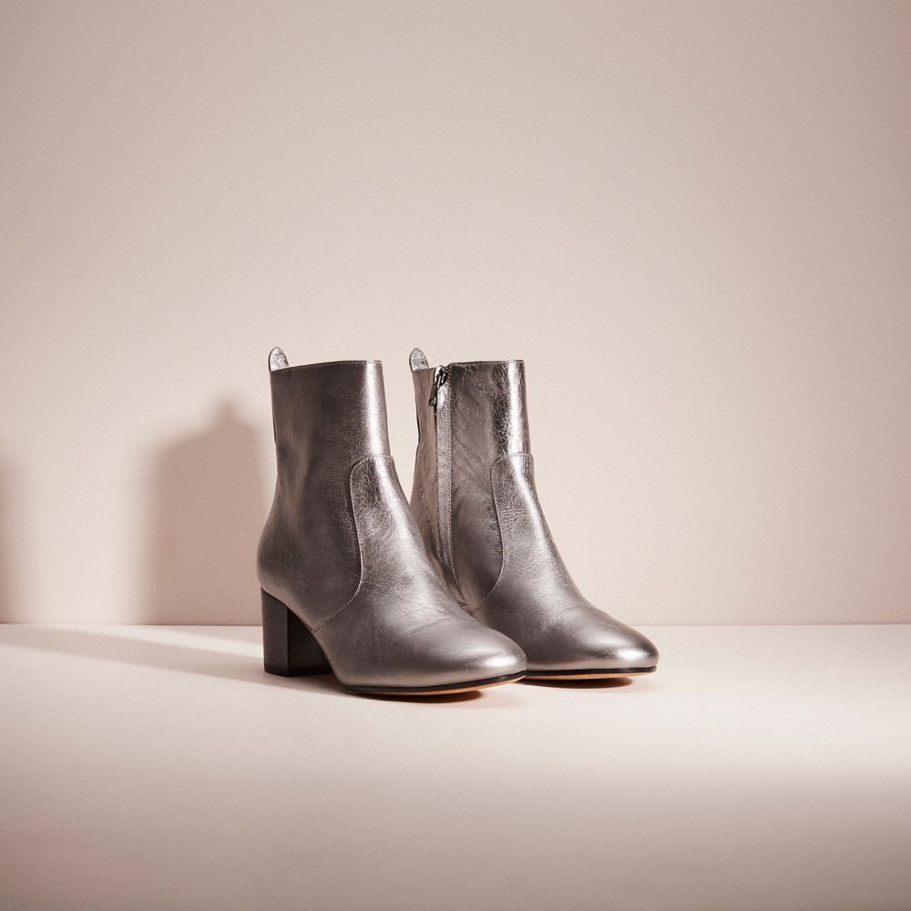 COACH®,RESTORED JULIET ANKLE BOOTIE,Metallic Leather,Gunmetal,Angle View