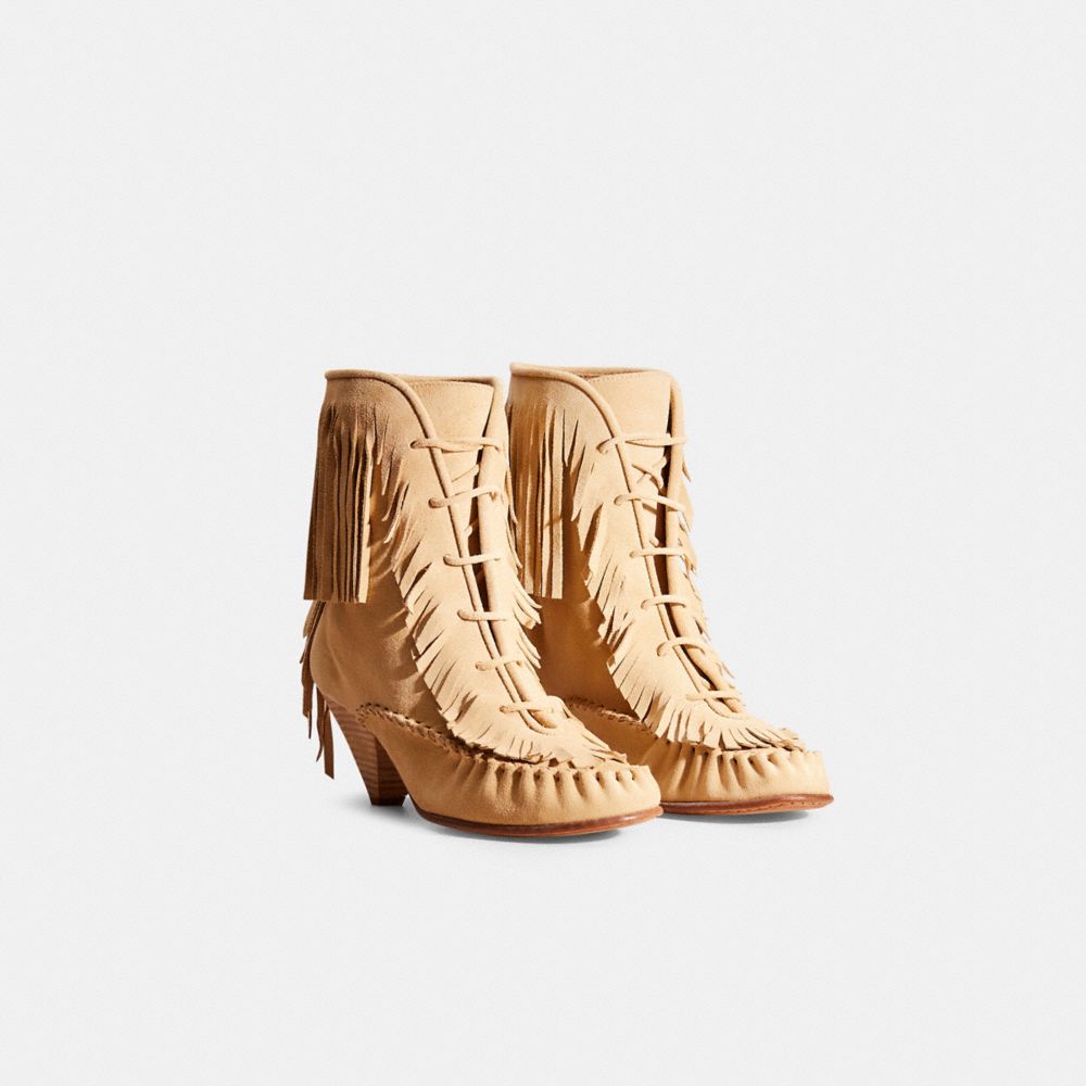 COACH®,RESTORED FRINGE BOOT,Light Tan,Angle View