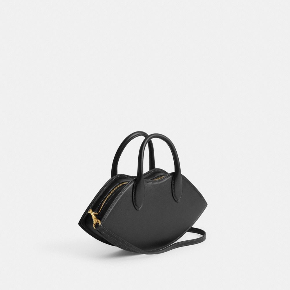 COACH®,LIP BAG,Glovetan Leather,Small,Brass/Black,Angle View
