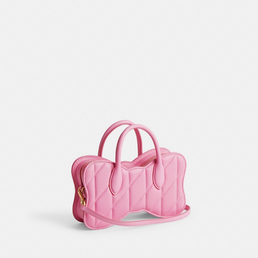 COACH®,Bow Bag With Quilting,Leather,Lining Lining Fabric Content,Crossbody,3D Embellishment,Embossed,Logo,Day Party,Pink,Angle View