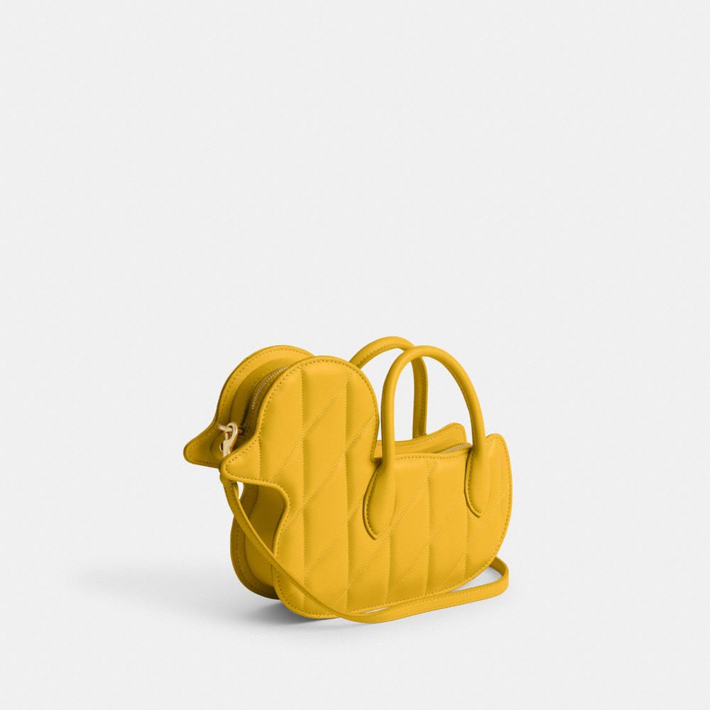COACH®,DUCK BAG WITH QUILTING,Nappa leather,Medium,Brass/Canary,Angle View
