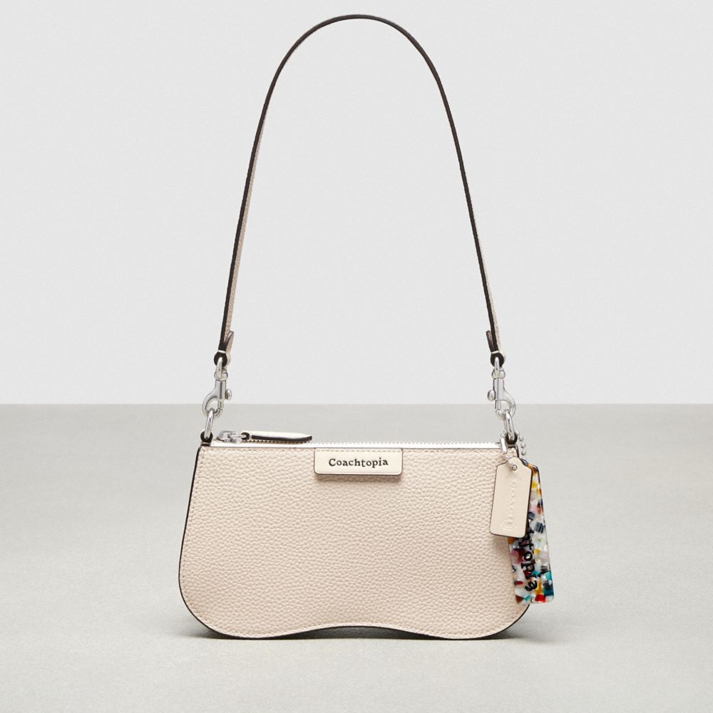 COACH®,Wavy Baguette Bag In Pebbled Coachtopia Leather,Small,Cloud,Front View image number 0