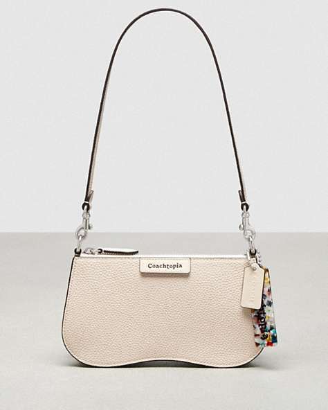 COACH®,Wavy Baguette Bag In Pebbled Coachtopia Leather,Small,Cloud,Front View