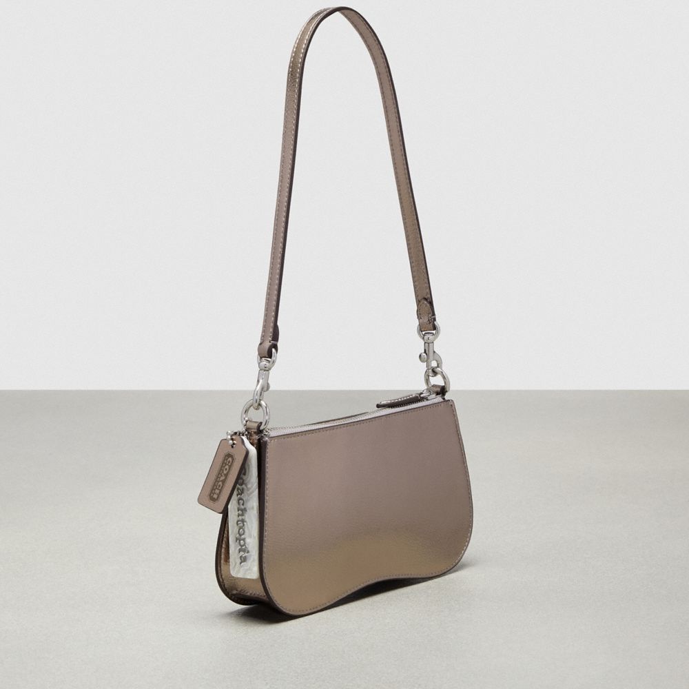 Shop Coach Wavy Baguette Bag In Metallic Topia Leather In Metallics