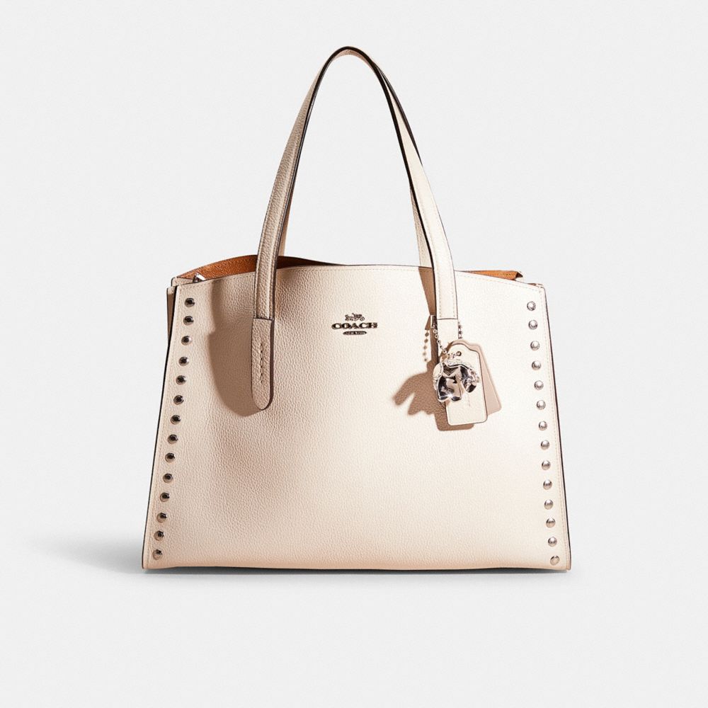 Coach charlie cheap carryall rivets