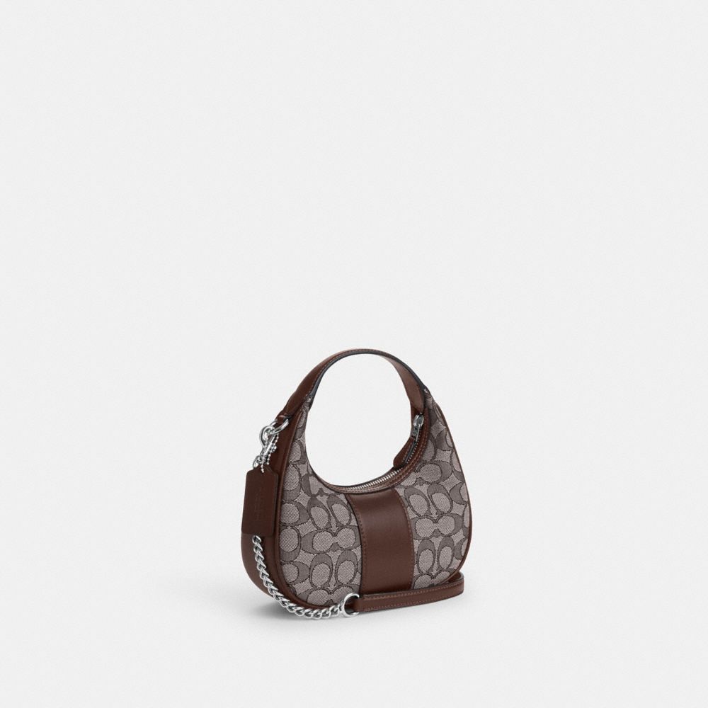 COACH®,CARMEN MINI CROSSBODY IN SIGNATURE JACQUARD,Non Leather,Small,Sv/Oak/Maple,Angle View