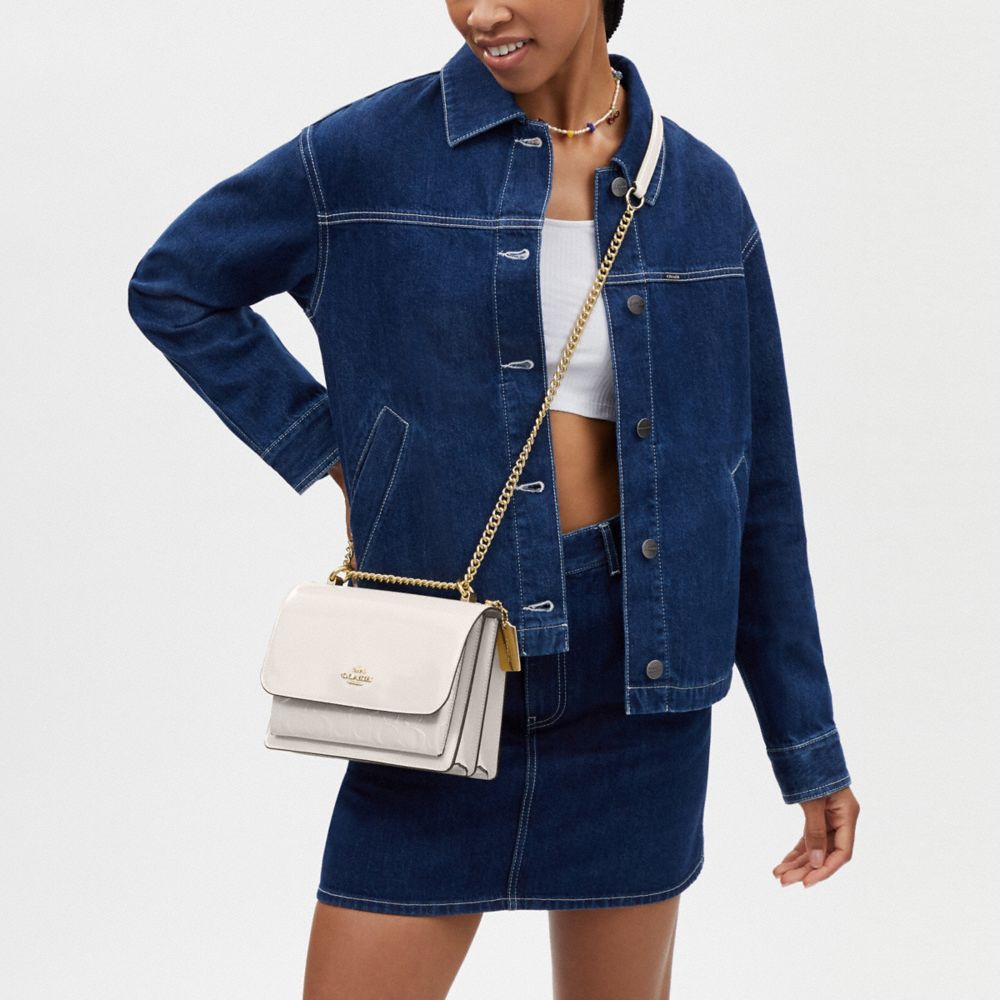 COACH®,Klare Crossbody Bag In Signature Leather,Crossbody,Logo,Metal,Day Party,White,Detail View