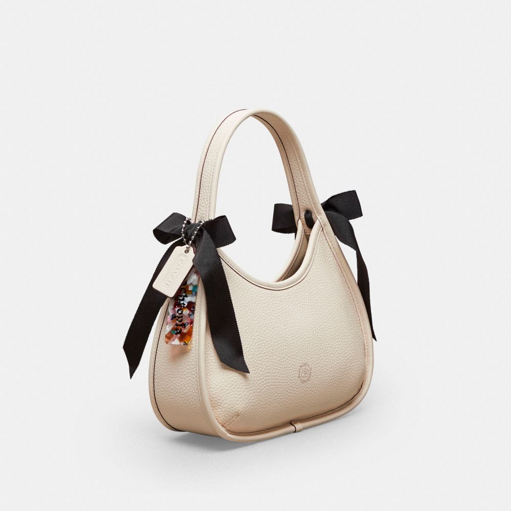 COACH®,Ergo Bag In Coachtopia Leather With Bows,Leather,Polyester,Shoulder Bag,Plastic,Logo,Embossed,Bow,Day Party,Cream,Angle View