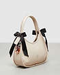 COACH®,Ergo Bag with Bows,Coachtopia Leather,Small,Cloud,Angle View