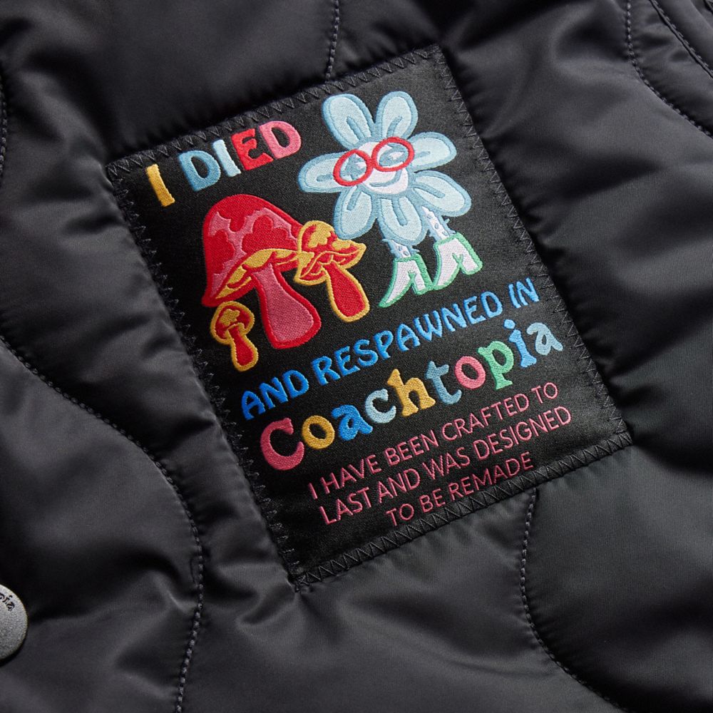 COACH®,Coachtopia Loop Cargo Vest,Recycled Polyester,Quilted,Vest,Logo,Tag Embellishment,Sustainable,Casual,Black,Closer View