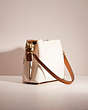 COACH®,UPCRAFTED WILLOW BUCKET BAG IN COLORBLOCK,Holiday Glow Up,Brass/Chalk Multi,Angle View