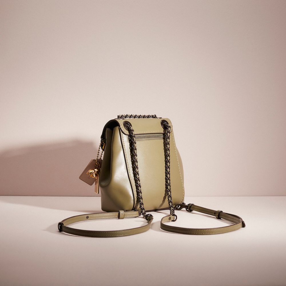 COACH®,UPCRAFTED PARKER CONVERTIBLE BACKPACK 16,Holiday Glow Up,Pewter/Light Fern,Angle View