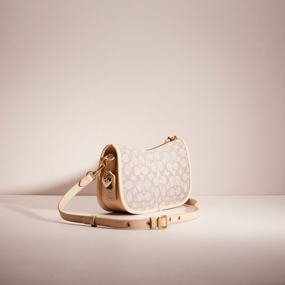 COACH®,Upcrafted Swinger Bag In Signature Jacquard,,Angle View