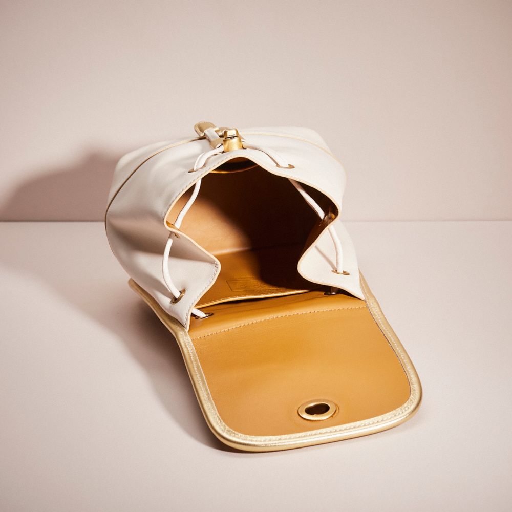 COACH®,UPCRAFTED TURNLOCK BACKPACK,Holiday Glow Up,Brass/Chalk,Inside View,Top View