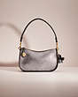 COACH®,UPCRAFTED SWINGER BAG,Holiday Glow Up,Brass/Black,Front View