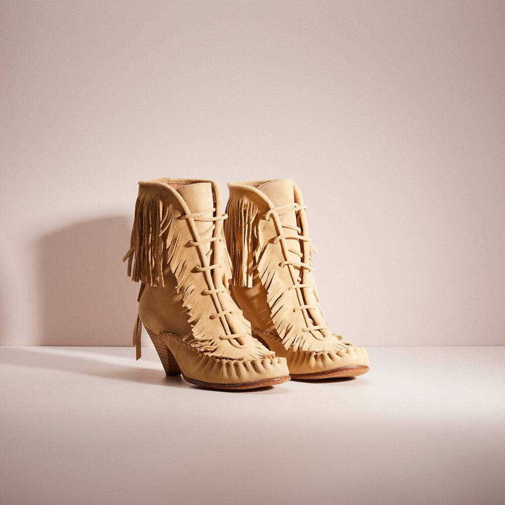 Coach on sale fringe boot