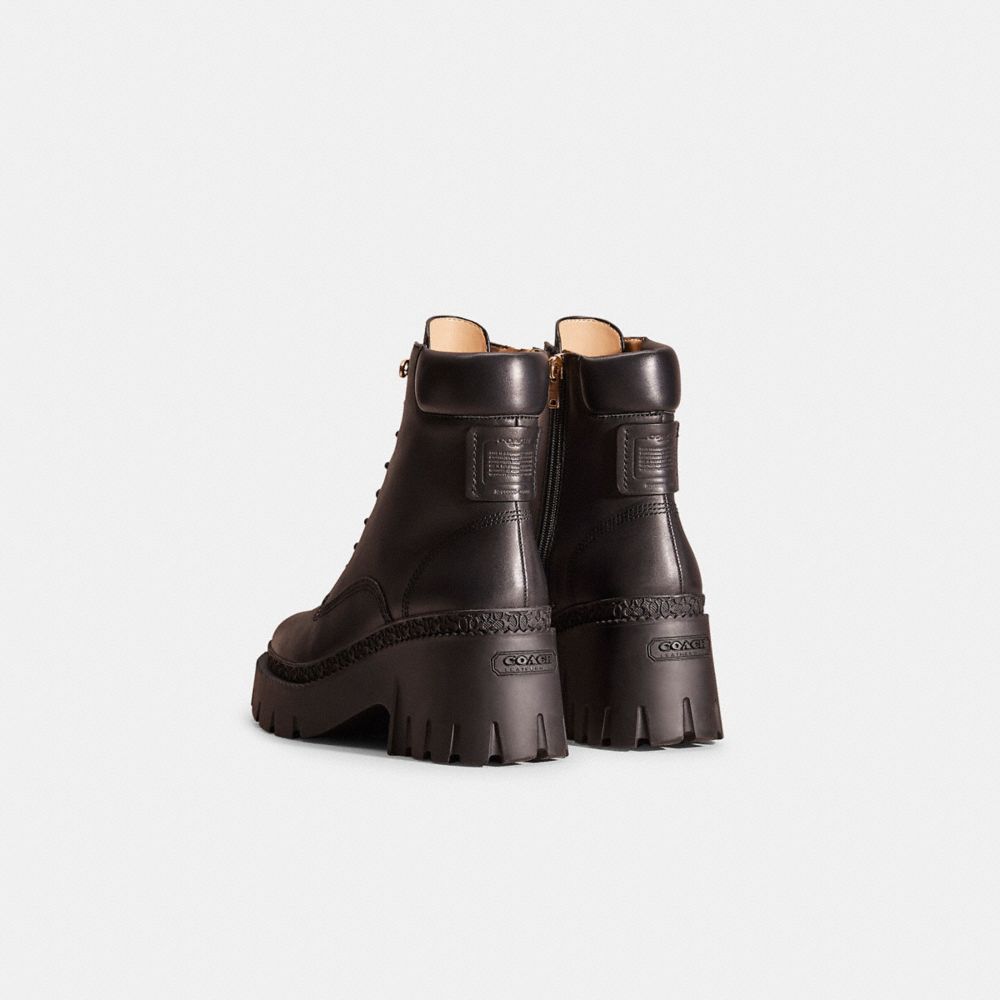 COACH®,Restored Ainsely Bootie,Rubber,Combat,Foam,Embossed,Logo,Metal,Traction,Pull Tab,Day Party,Black,Back View
