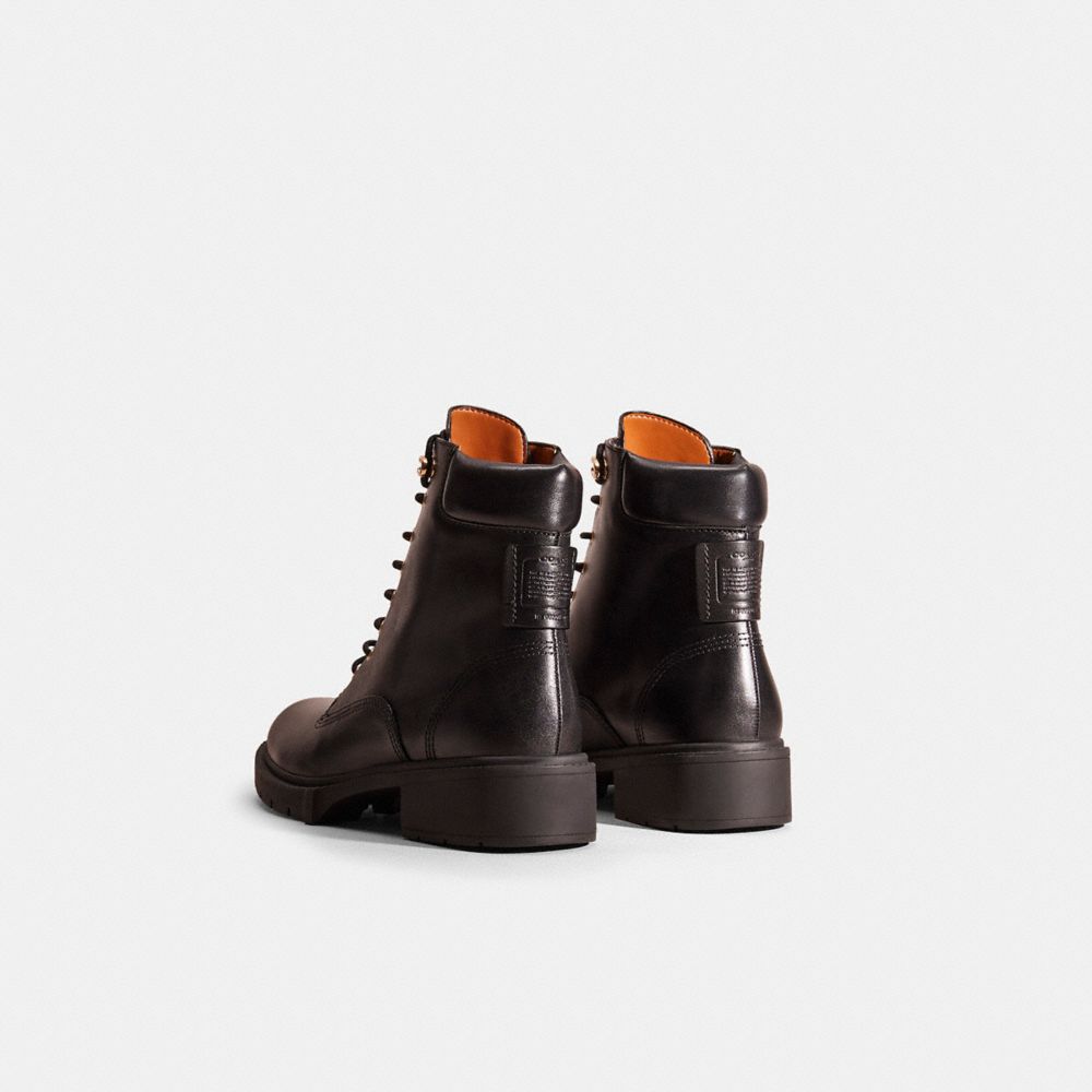 COACH®,Restored Lorimer Bootie,Leather,Rubber,Combat,Applique,Logo,Metal,Traction,Casual,Black,Back View