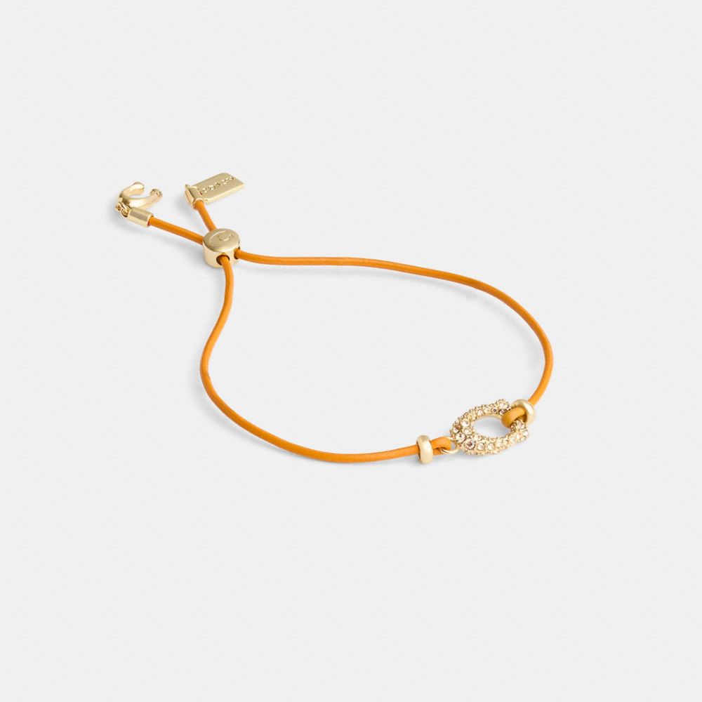 COACH®,BRACELET COULISSANT EN CUIR SIGNATURE À PAVÉ,Or/Orange Multi,Front View