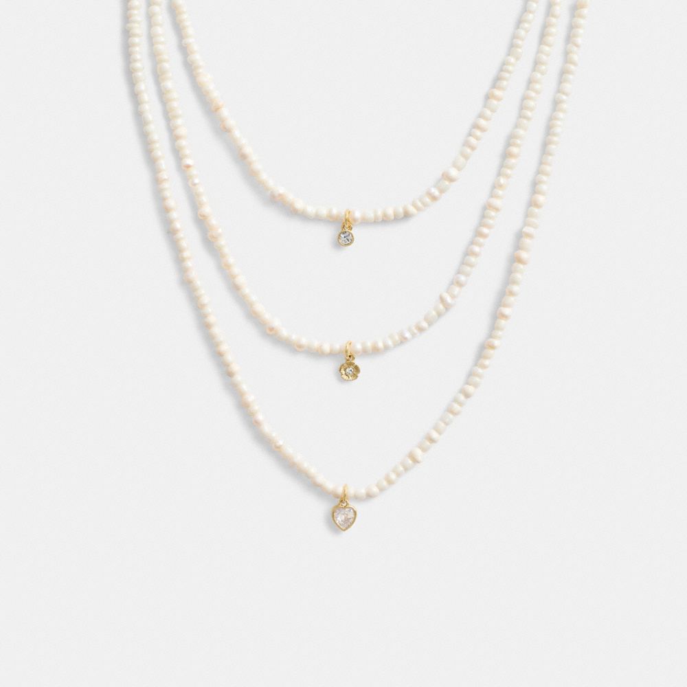 COACH®,LAYERED PEARL CHARM NECKLACE,Gold/Pearl,Front View