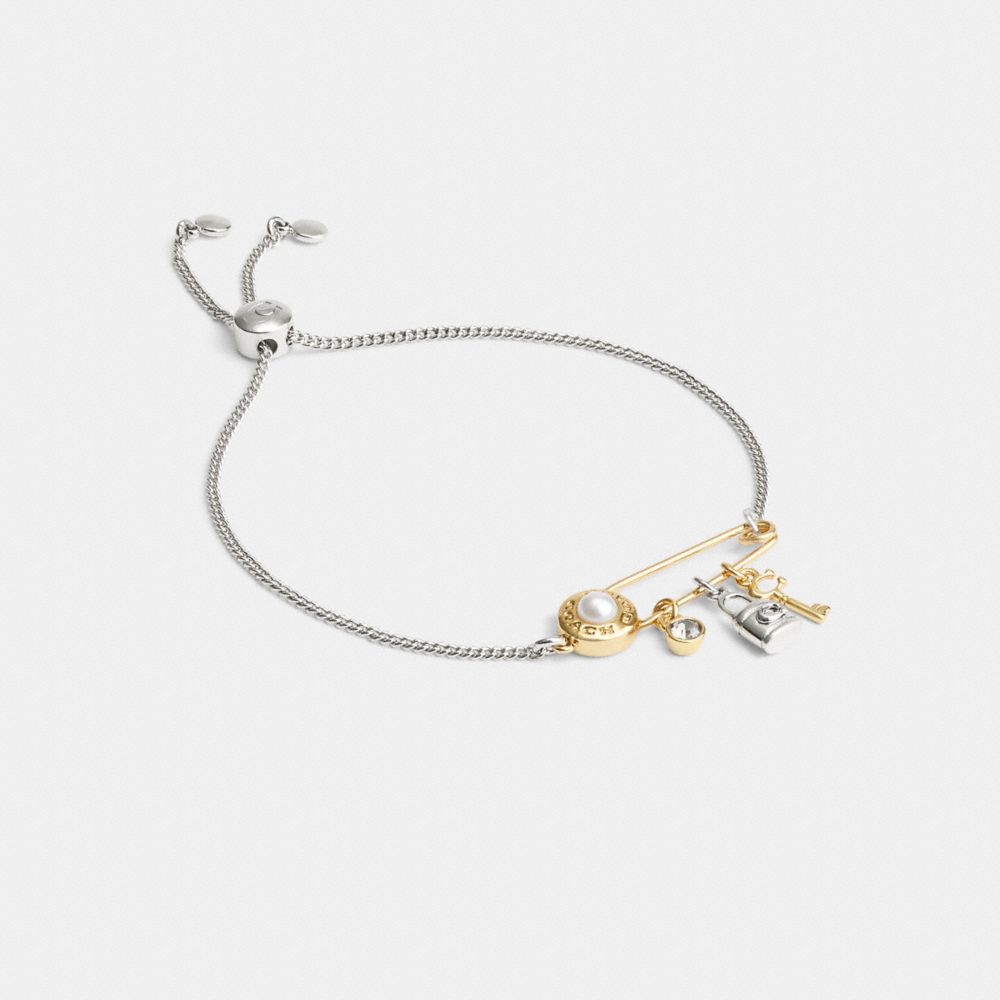 COACH®,SAFETY PIN CHARM SLIDER BRACELET,Gold/Silver,Front View