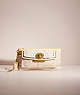 COACH®,RESTORED PENELOPE CLUTCH IN SIGNATURE,Signature fabric,Brass/Ivory Multi,Front View