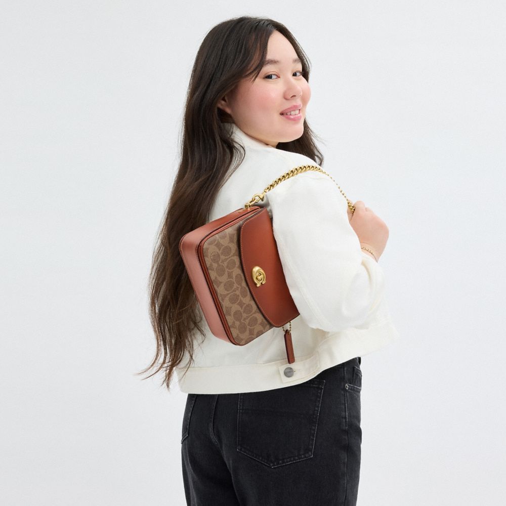 COACH®,Cassie Crossbody Bag 19 In Signature Canvas,Canvas,Leather,Crossbody,Color Block,Compact,Brass,Day Party,Brown,Detail View