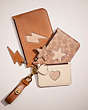 COACH®,REMADE TRIO POUCH SET WITH CUT OUTS,Beige Multi,Front View