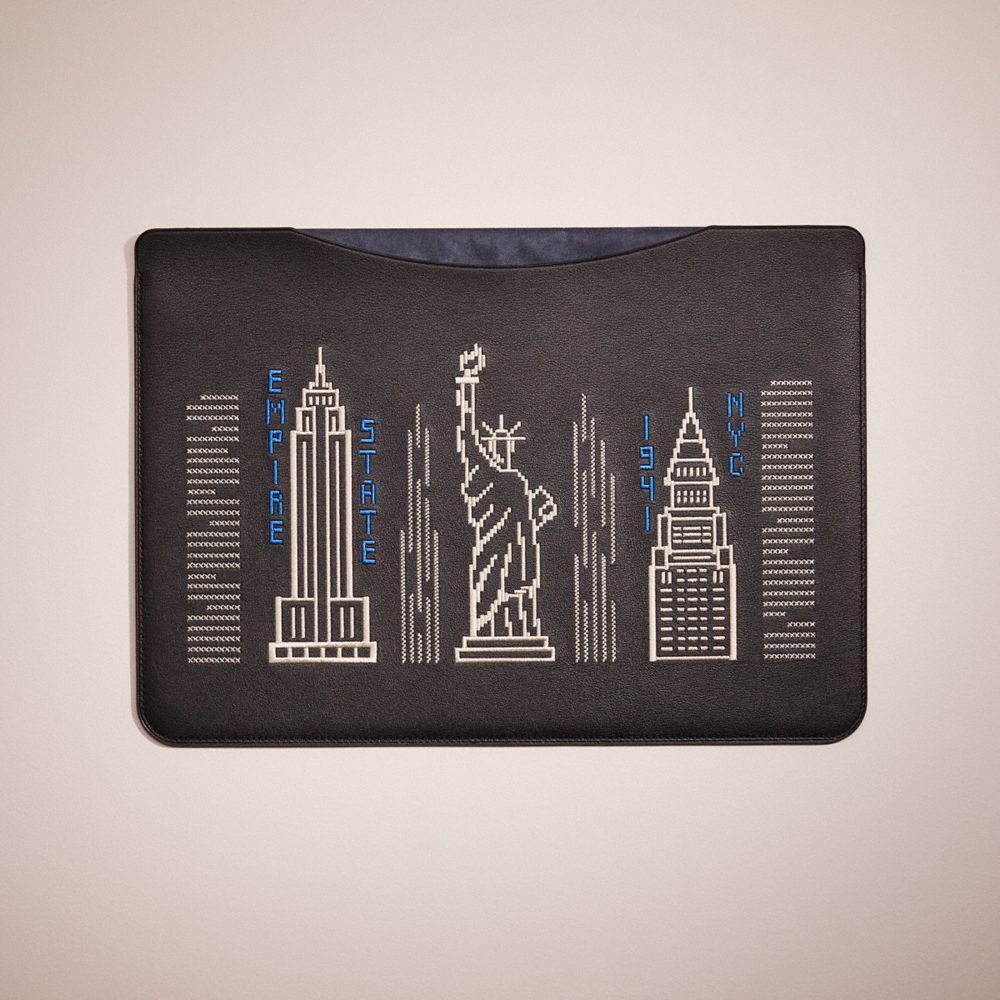 COACH® Restored Laptop Sleeve With Stardust City Skyline