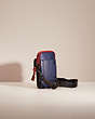 COACH®,RESTORED PACER CONVERTIBLE POUCH IN COLORBLOCK SIGNATURE CANVAS WITH COACH PATCH,True Navy Multi,Angle View