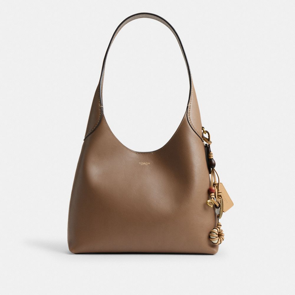 COACH®,BRELOQUE DE SAC HÉRITAGE,Laiton/Havane,Angle View