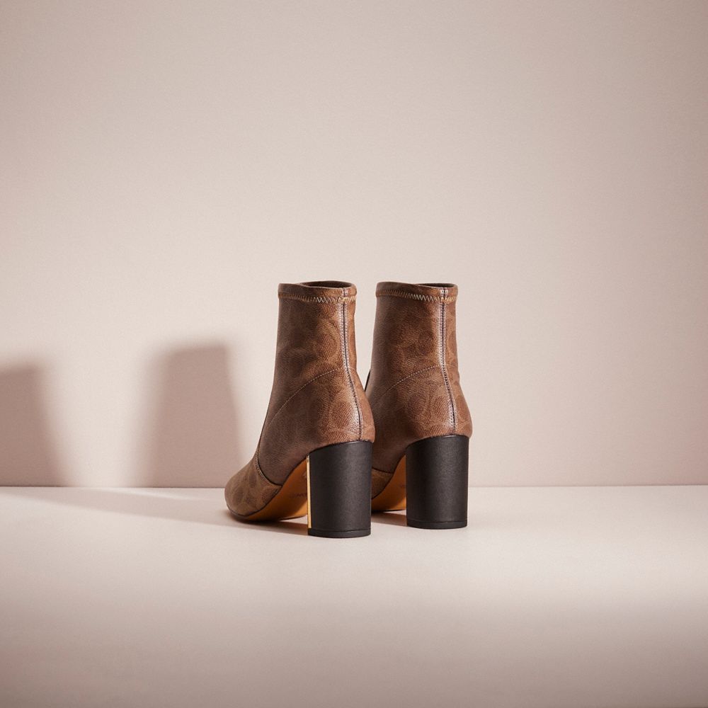 COACH®,Restored Margot Bootie,Leather,Rubber,Bootie,Metal,Traction,Gold Metal,Day Party,Brown,Back View