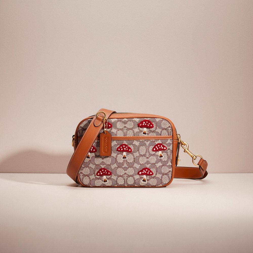 COACH®,RESTORED FLIGHT BAG IN SIGNATURE TEXTILE JACQUARD WITH MUSHROOM MOTIF EMBROIDERY,Brass/Cocoa,Front View