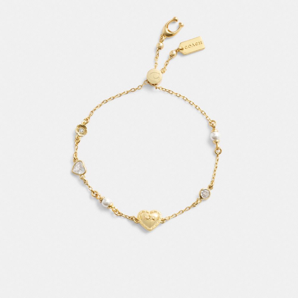 COACH®,Pearls And Heart Slider Bracelet,Glass,Pearl,Crystal,Cubic Zirconia,Gem Embellishment,Pearl,Logo,Lettering Word,Flo...,Multi Color,Inside View,Top View