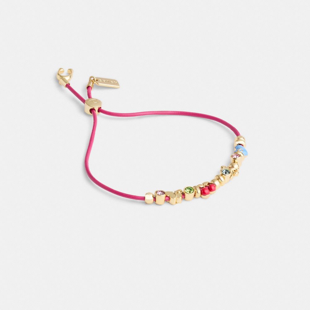 COACH®,Cherry And Heart Multi Charm Leather Slider Bracelet,Leather,Glass,Enamel,Cubic Zirconia,Crystal,Bead Embellishment...,Fuchsia,Front View